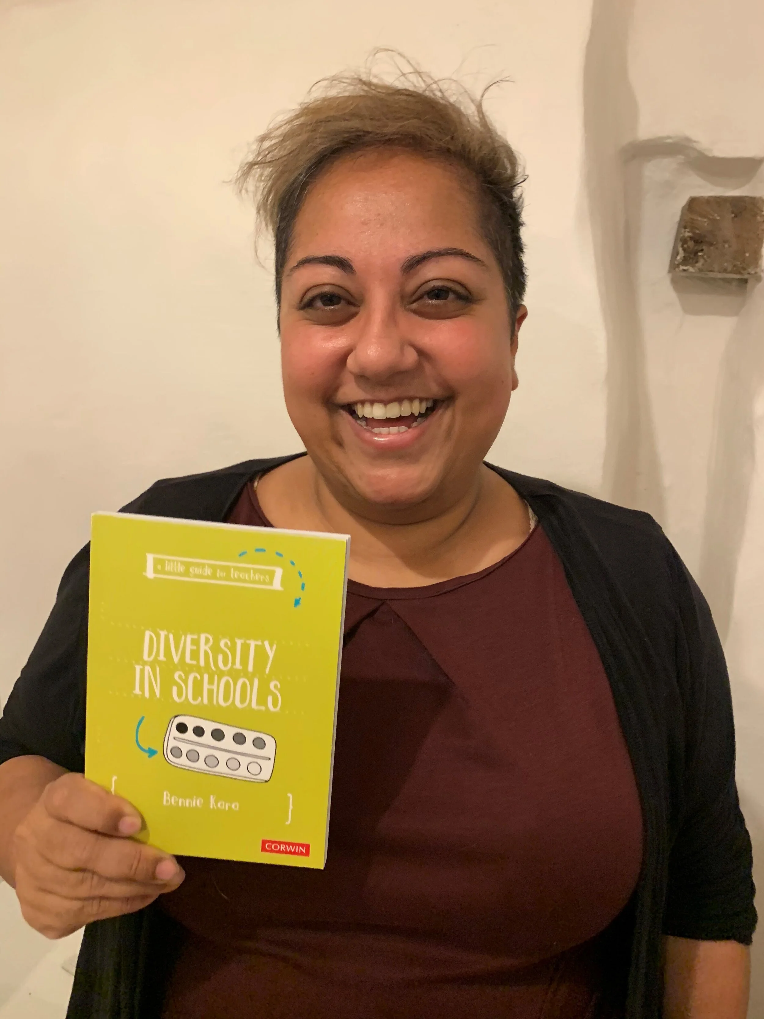 Bennie Kara, deputy headteacher at The Bemrose School, shows off her book ‘A Little Guide for Teachers: Diversity in the Curriculum’.