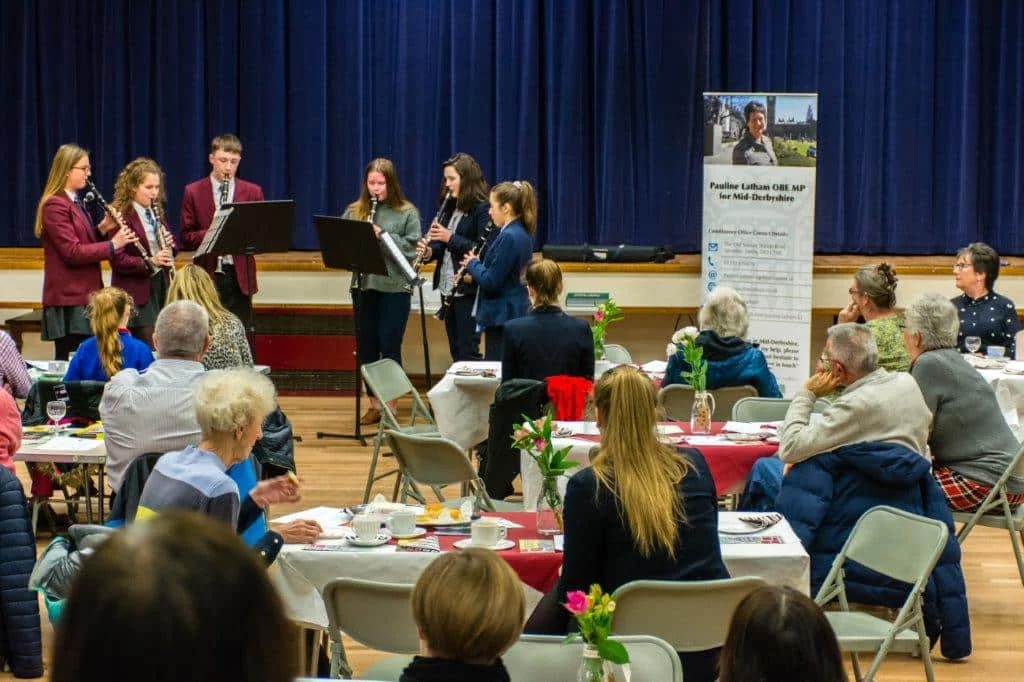 Ecclesbourne School students held a tea party for locals to help combat lonliness. Penguin PR: public relations, media and communications.