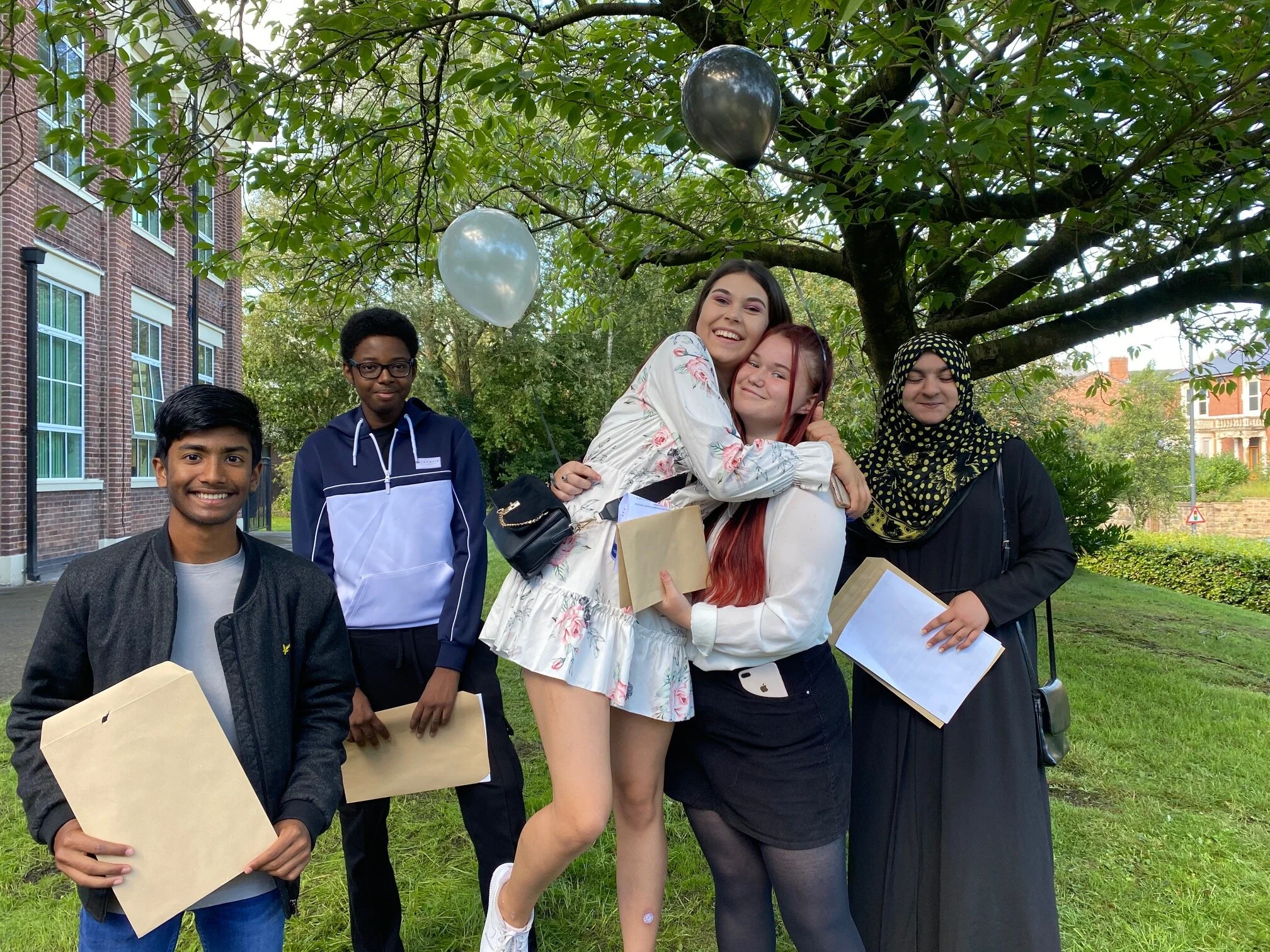 Students celebrating their GCSE results at The Bemrose School.