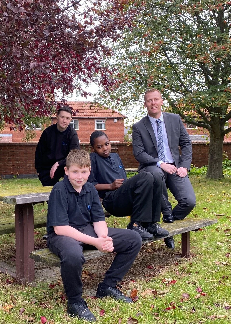 From left: Shay Macken (back row) and Junior Taylor, Karim Baptiste and head of provision Martin Capewell.