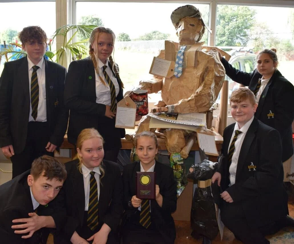 Pupils from Swinton Academy with their scarecrow.