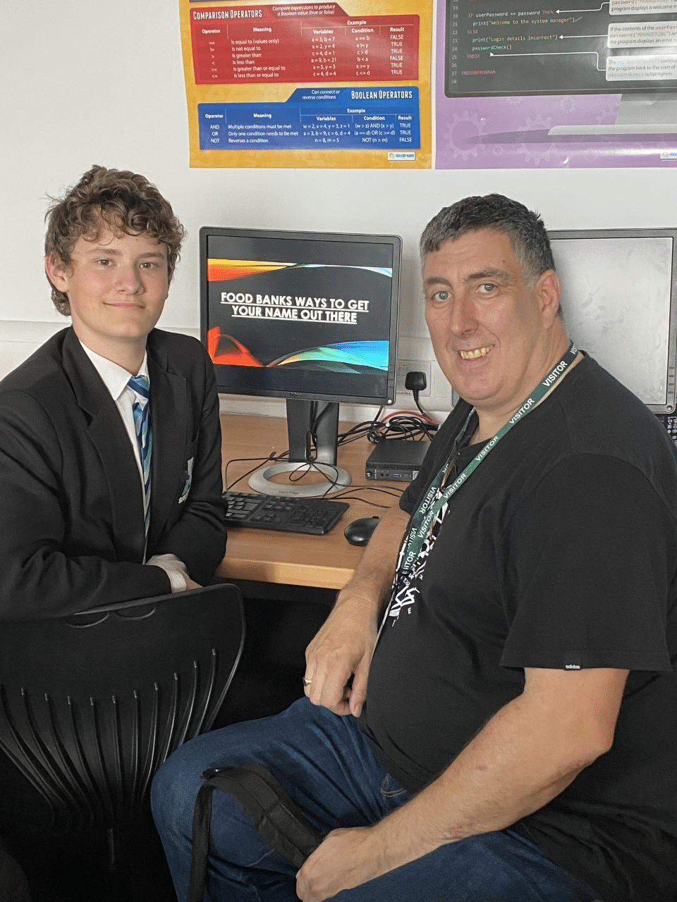 Shirebrook Academy student Thomas Brown is congratulated by David Spencer from Storehouse after he put together a presentation on how the organisation can use social media to spread the word.