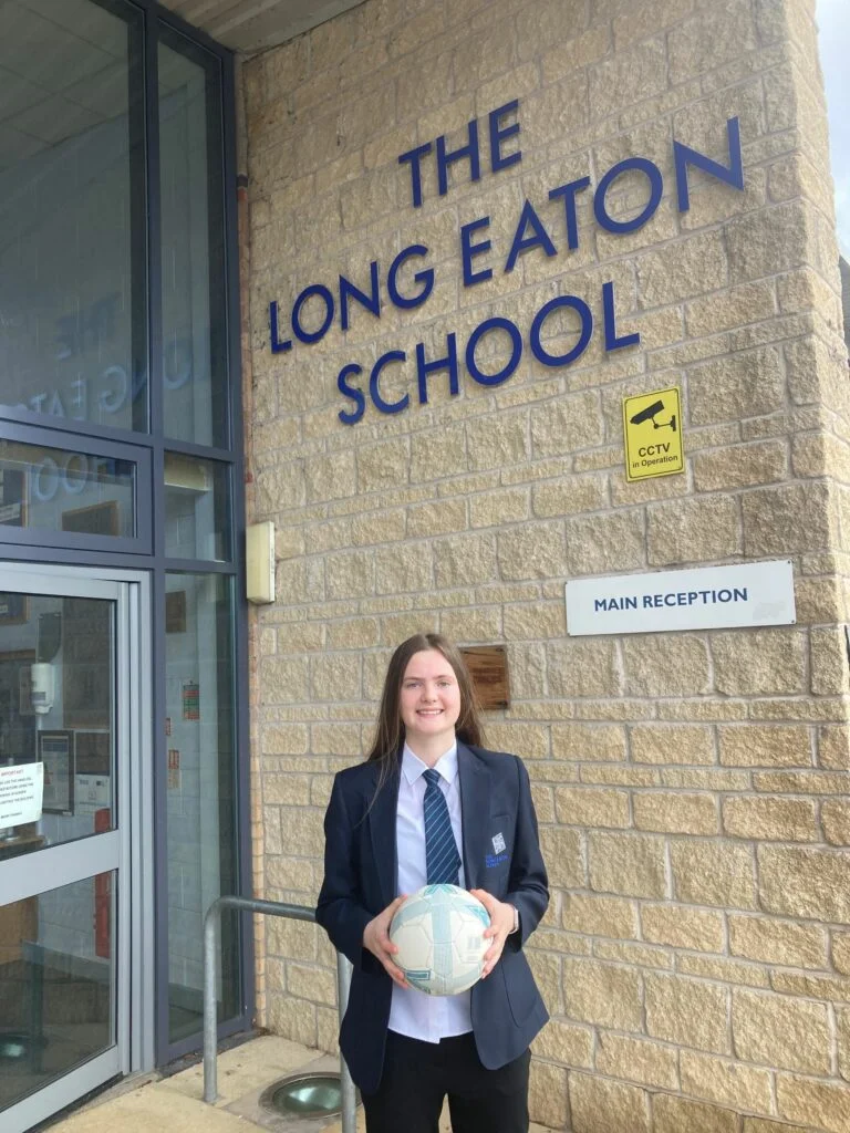 Milly Wheldon outside The Long Eaton School