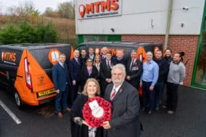 Karen Davies and Malcolm Prentice with the MTMS as the rail maintenance firm held a morning of remembrance