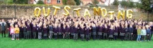 Pupils at William Gilbert celebrating the Ofsted report