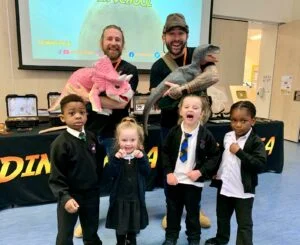 Owen, Lyla, Shayla and Eloghosa with Rangers Chris Roberts and Andy Beynon, of Dinomania