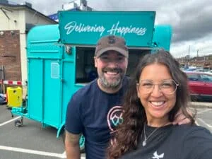 Husband-and-wife Adam and Natalie, of Colleague Box, with their corporate trailer