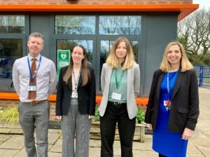 Geography teacher Lloyd Dyson, Abby Devlin, Claudia Meyer and headteacher Nicola Caley at Murray Park School