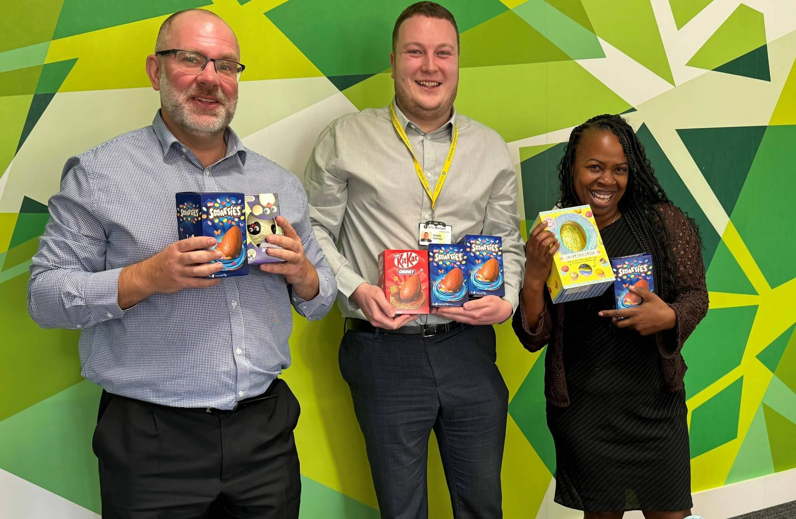 Steve Wyatt, Rob Holmes and Kareen Jones from NFU Mutual, with the Easter eggs