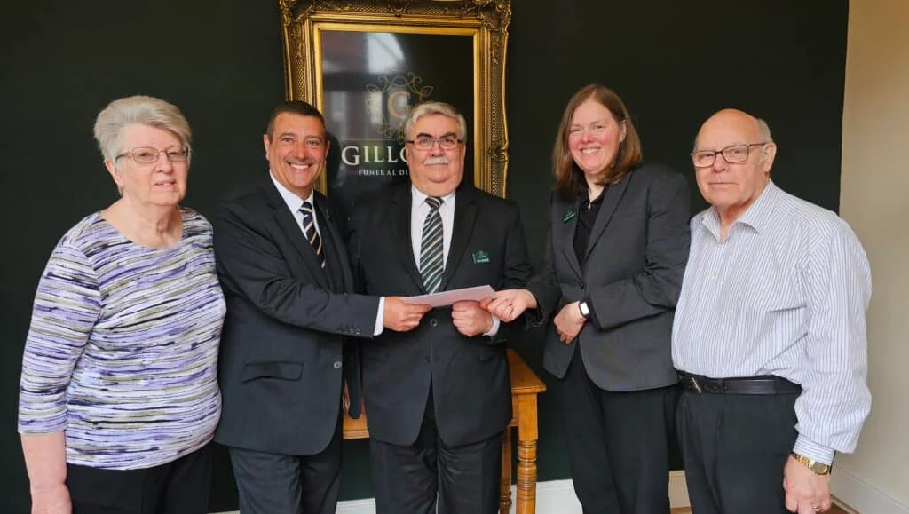 Alan Winfield, centre, has called it a day after 45 years working in the funeral industry and was presented with a gift by (from left()Elaine Hutsby, a partner in Gillotts Funeral Directors, Anthony Topley, Joanne Hutsby and Barry Hutsby.