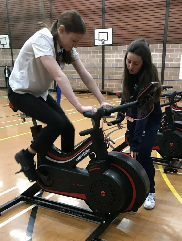 Maisie Moore on a Wattbike at Murray Park School.