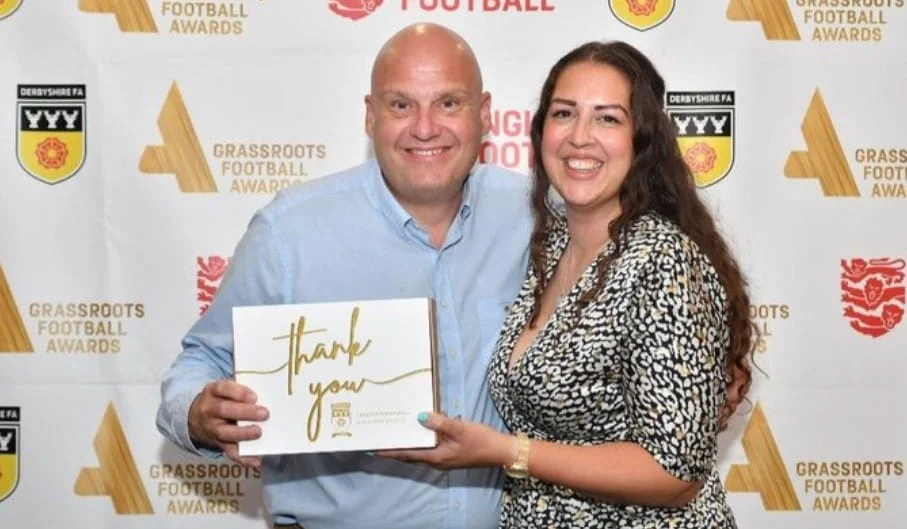 Ilkeston Town's Mark Frost is pictured with Natalie Bamford of Colleague Box.