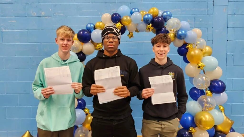 From left, Alex Capewell, Ted Enabulele and Owen Jones, all 16, picked up their GCSE results at Derby Cathedral School today.