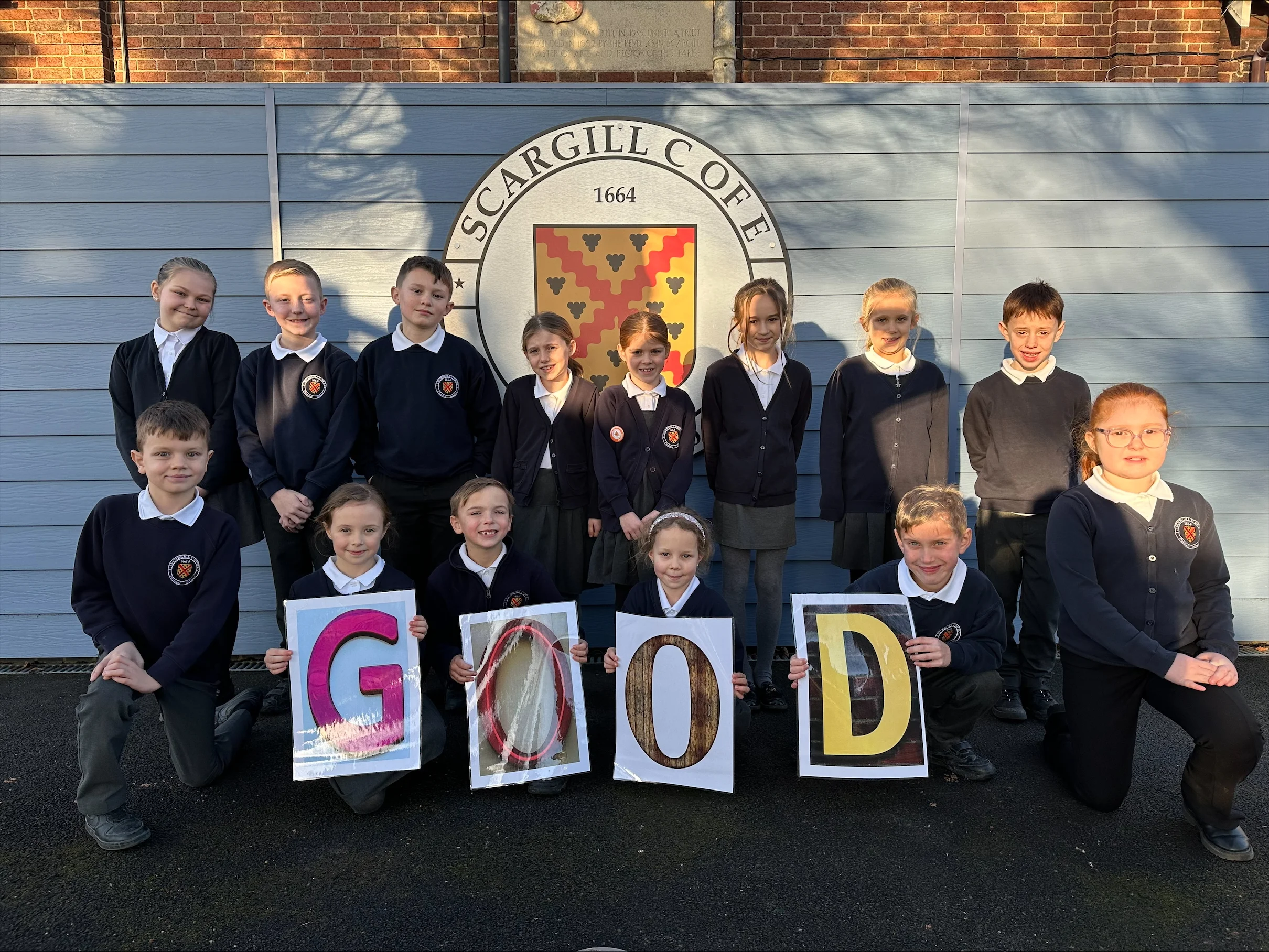 Pupils at the Scargill Church of England school celebrate a 'GOOD' Ofsted report