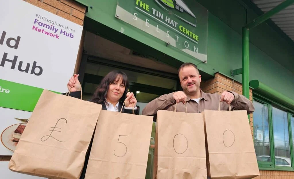 Danni Allen, a funeral director at Gillotts Funeral Directors, with Chris Tomlinson, manager of the Tin Hat Centre Food Bank in Selston, which has received £500 from the firm’s Christmas appeal.