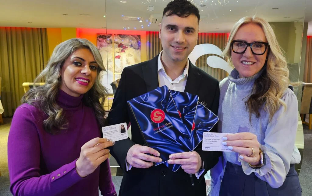 From left, Raj Johal, executive director of Blue Sky Brokers, Shahzad Mahmood, director of Shalimar Gold restaurant and Louise Moss, CEO of Disability Direct, celebrate the restaurant signing up to the Blue Sky Social Care Card.