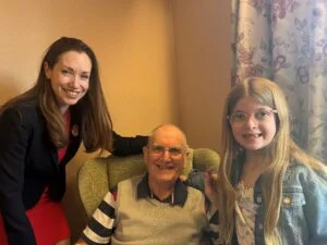 Seven Year old Skye, MP Catherine Atkinson and a resident of Brookfields nursing home posing for a photo