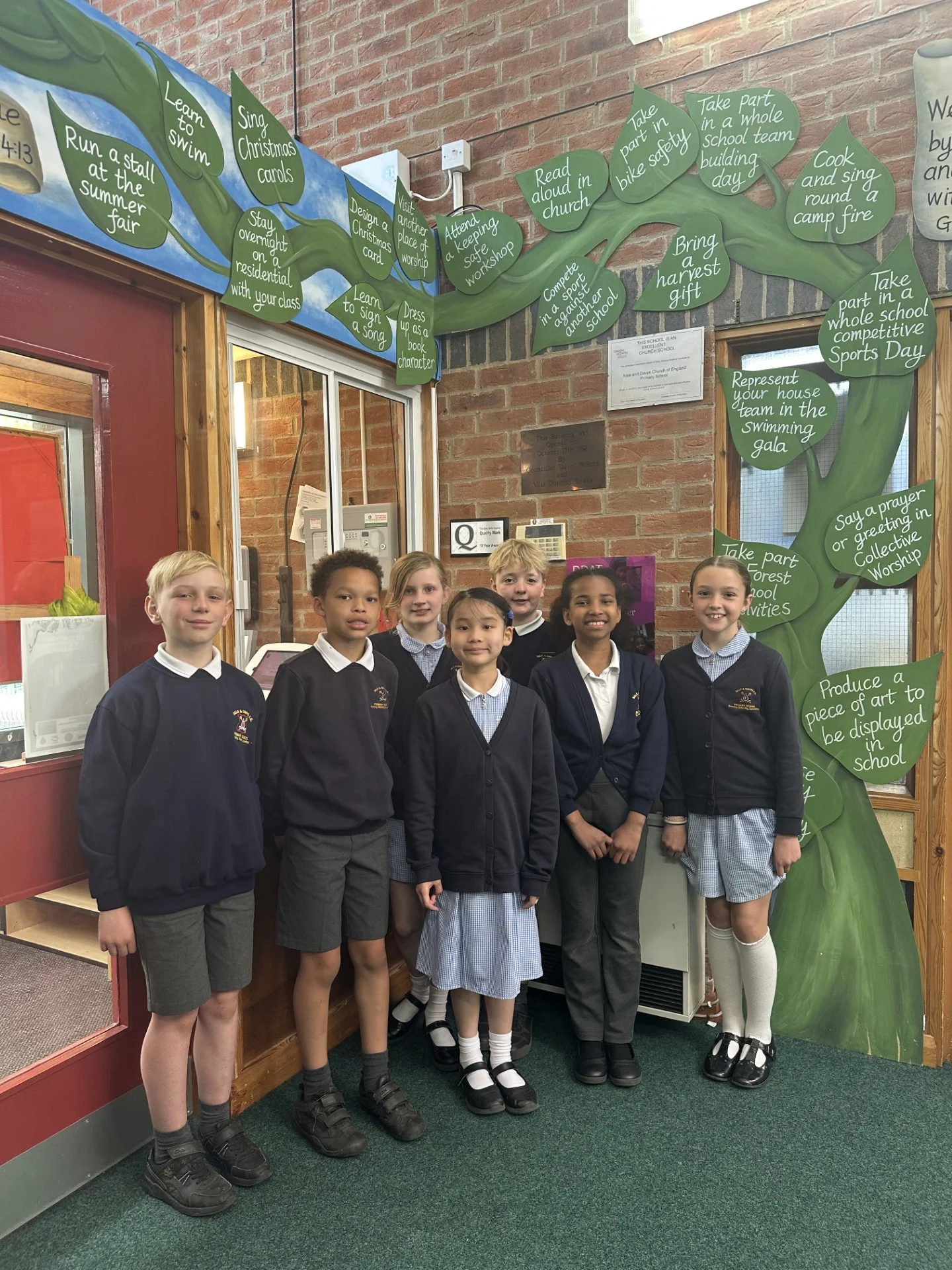 Students from Sale and Davys Primary School in front of a beanstalk in the foyer of their school