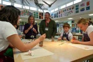 Repton students and teacher with Paul Cummins